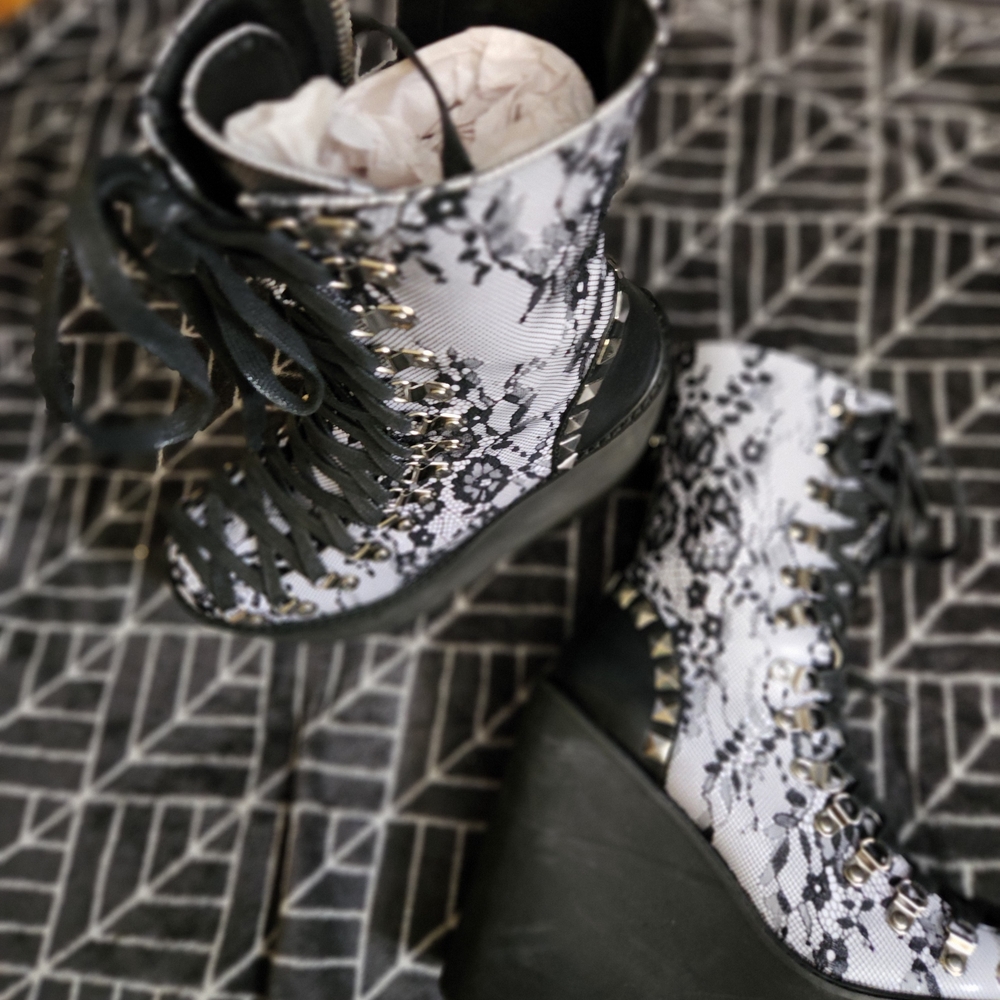 Elegant Black and White Lace-Up Boots